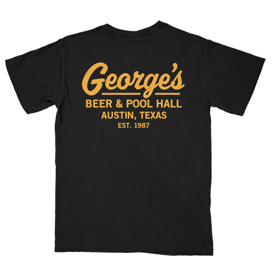 A black short-sleeve t-shirt shown from the back, featuring a retro-style yellow graphic print that reads 'George's BEER & POOL HALL AUSTIN, TEXAS EST. 1987'.
