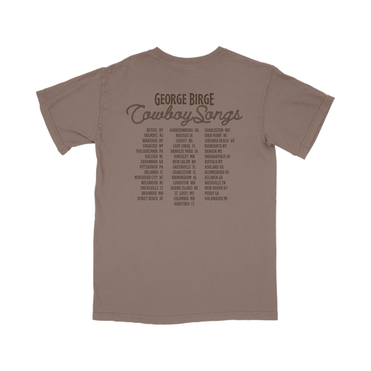 Brown t-shirt with cowboy songs tour cities on the back